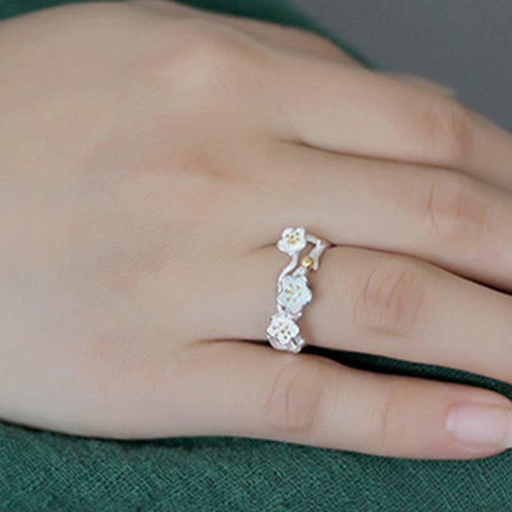 Anillo de plata de ley 925 con Buddha Stones y calma en el seno del ciruelo