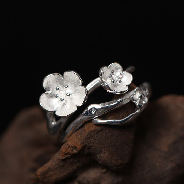 Anillo de equilibrio con seno ciruela y Buddha Stones en plata de ley 925