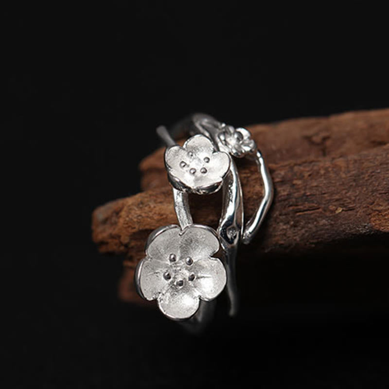 Anillo de equilibrio con seno ciruela y Buddha Stones en plata de ley 925