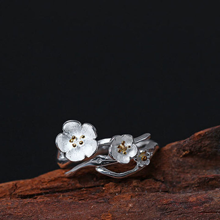 Anillo de equilibrio con seno ciruela y Buddha Stones en plata de ley 925