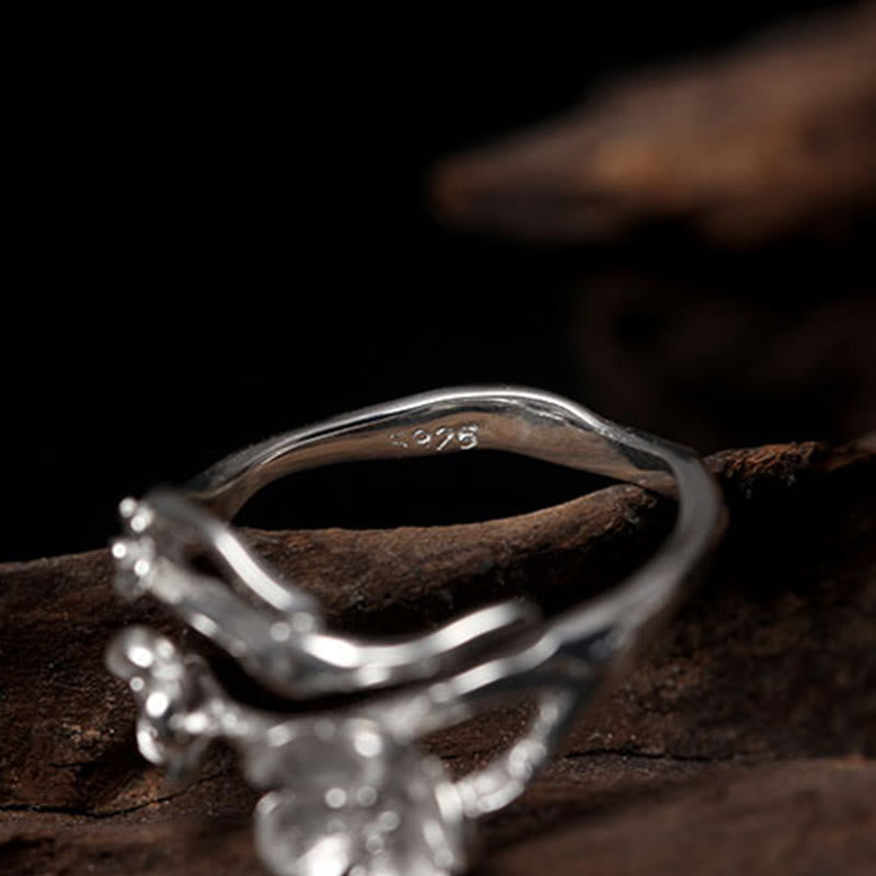 Anillo de equilibrio con seno ciruela y Buddha Stones en plata de ley 925
