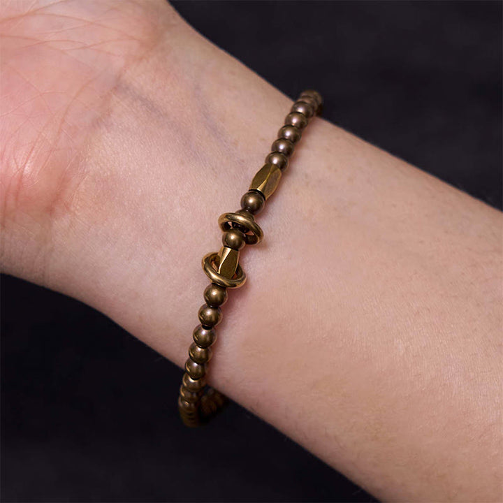 Pulsera de pareja con diseño de cuentas de cobre y latón para el cuidado personal y la riqueza de Buddha Stones - image 7