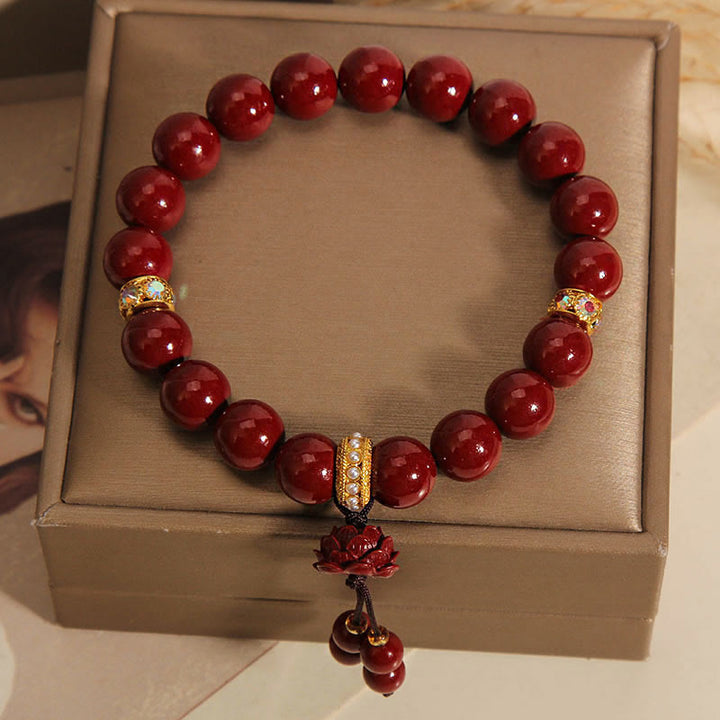 Pulsera con dijes de bendición de loto y cinabrio con Buddha Stones