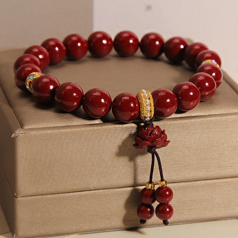 Pulsera con dijes de bendición de loto y cinabrio con Buddha Stones