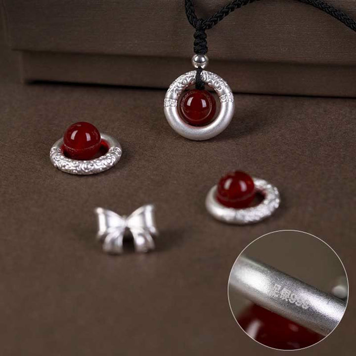 Collar con colgante de plata de ley 999 con Buddha Stones y hebilla de paz con ágata roja
