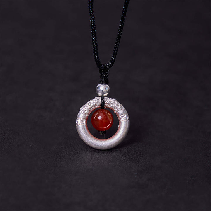 Collar con colgante de plata de ley 999 con Buddha Stones y hebilla de paz con ágata roja