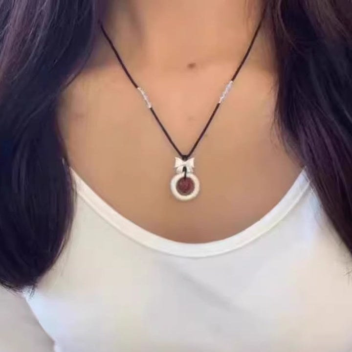 Collar con colgante de plata de ley 999 con Buddha Stones y hebilla de paz con ágata roja