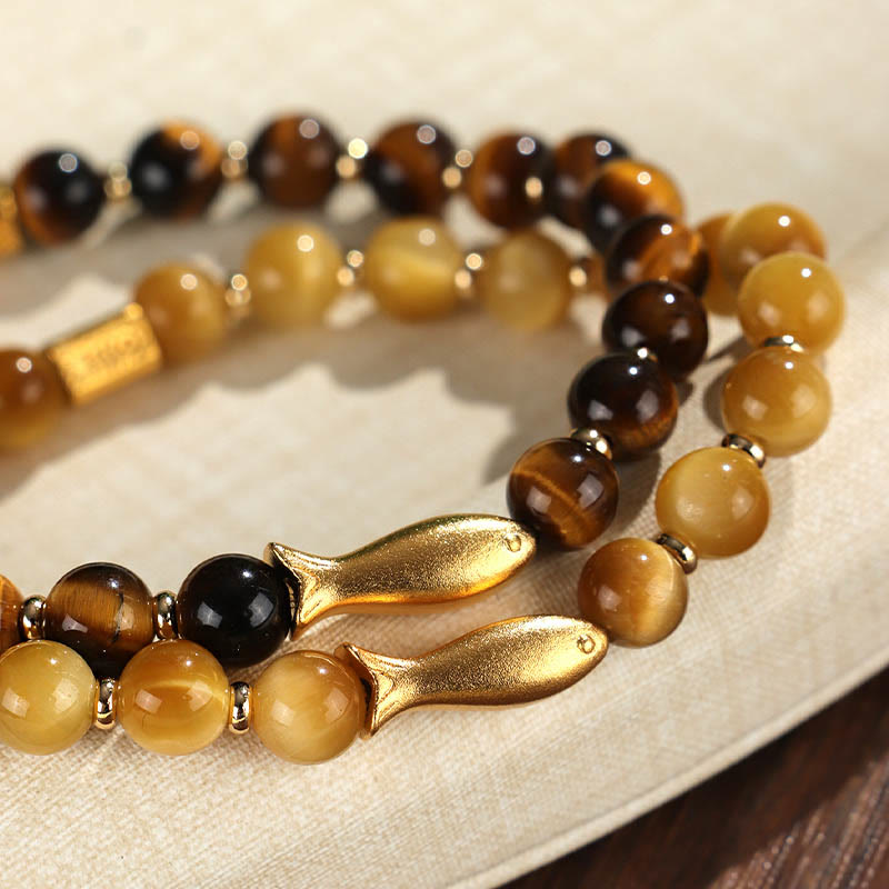 Pulsera de coraje con pez koi y ojo de tigre de Buddha Stones