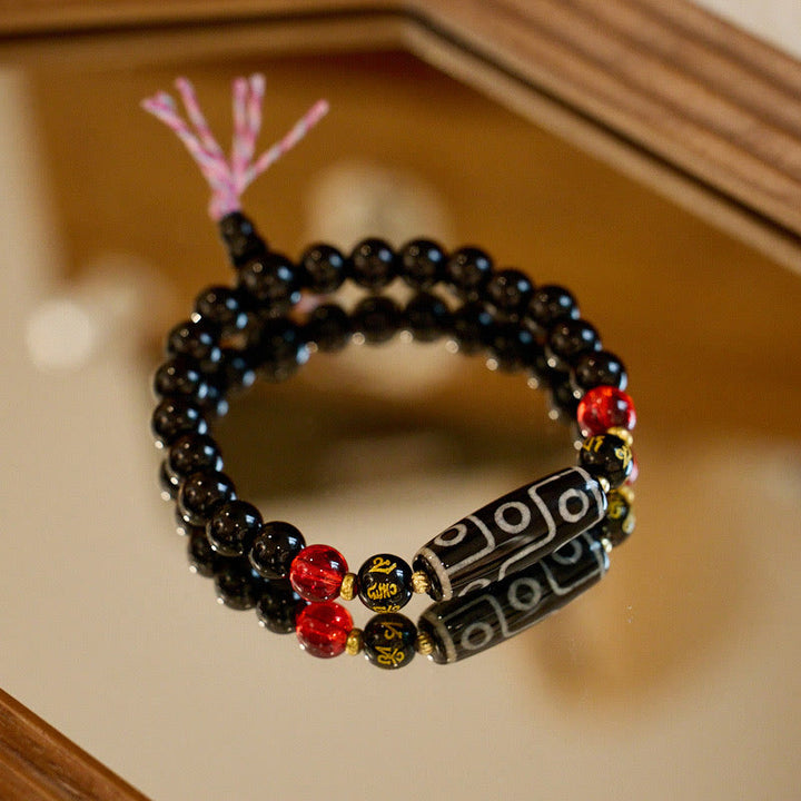 Pulsera de protección de riqueza con seis palabras verdaderas y cuentas Dzi tibetanas de nueve ojos y Buddha Stones de ónix negro