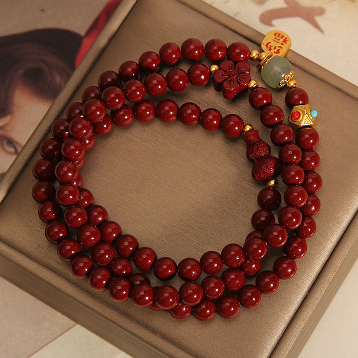 Pulsera de bendición de triple vuelta con forma de calabaza y flor con carácter Fu y Buddha Stones cinabrio