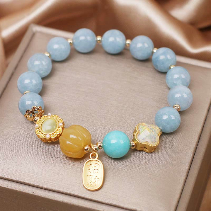 Pulsera de protección de la riqueza con aguamarina, calabaza y Buddha Stones