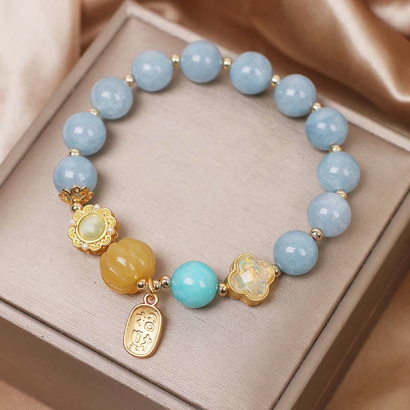 Pulsera de protección de la riqueza con aguamarina, calabaza y Buddha Stones