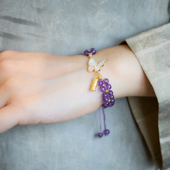 Pulsera de hilo trenzado que alivia el estrés con Buddha Stones, amatista, mariposa y bambú