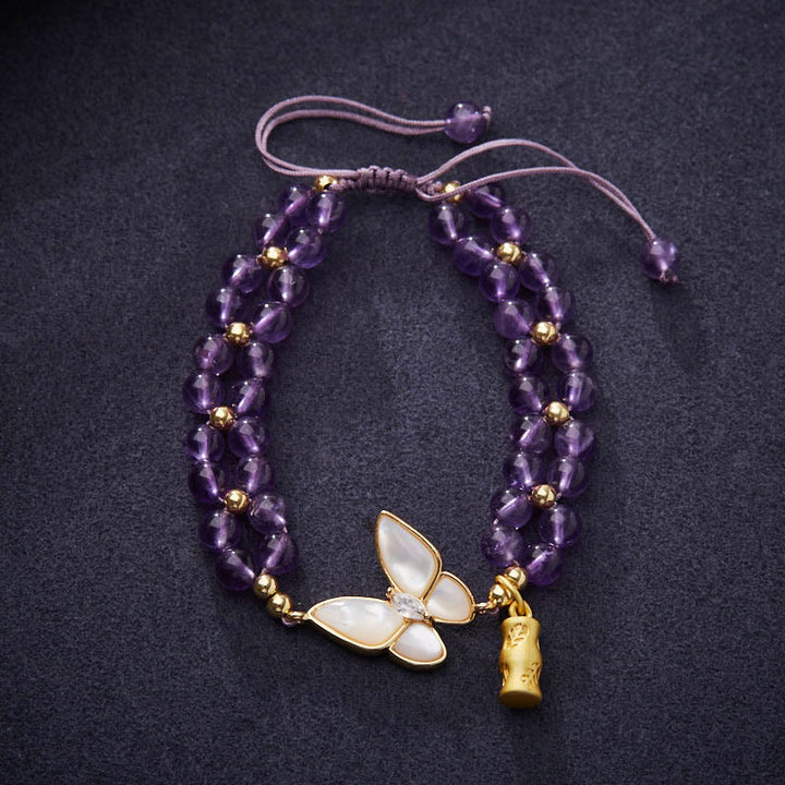 Pulsera de hilo trenzado que alivia el estrés con Buddha Stones, amatista, mariposa y bambú