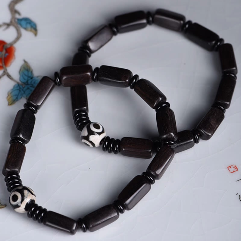 Pulsera de equilibrio con cuentas rectangulares de madera de ébano y Buddha Stones