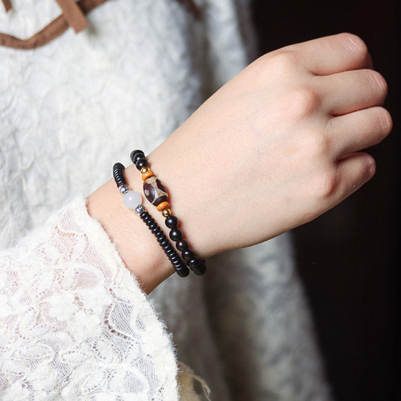 Pulsera de doble vuelta con cuentas Dzi de sándalo, ébano y sándalo verde y Buddha Stones