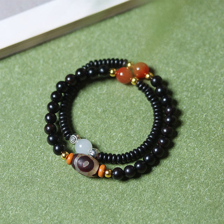 Pulsera de doble vuelta con cuentas Dzi de sándalo, ébano y sándalo verde y Buddha Stones