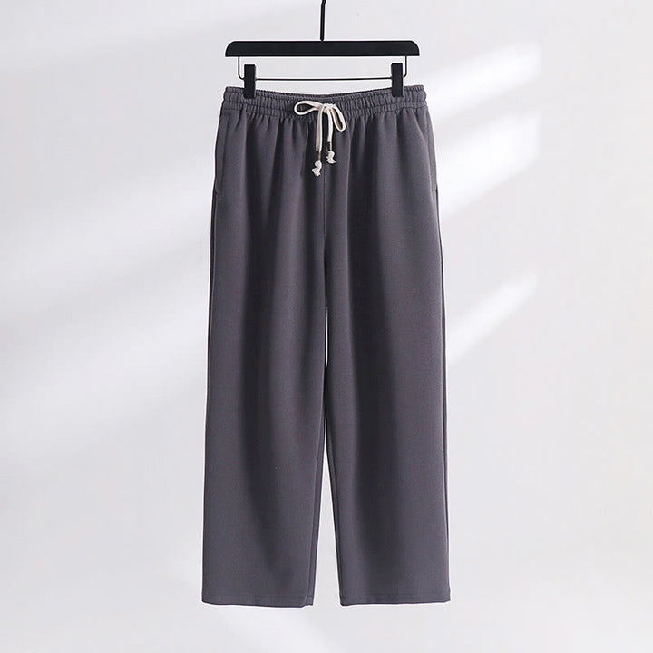 Pantalones de hombre con bolsillos y tejido polar de algodón de color liso con Buddha Stones