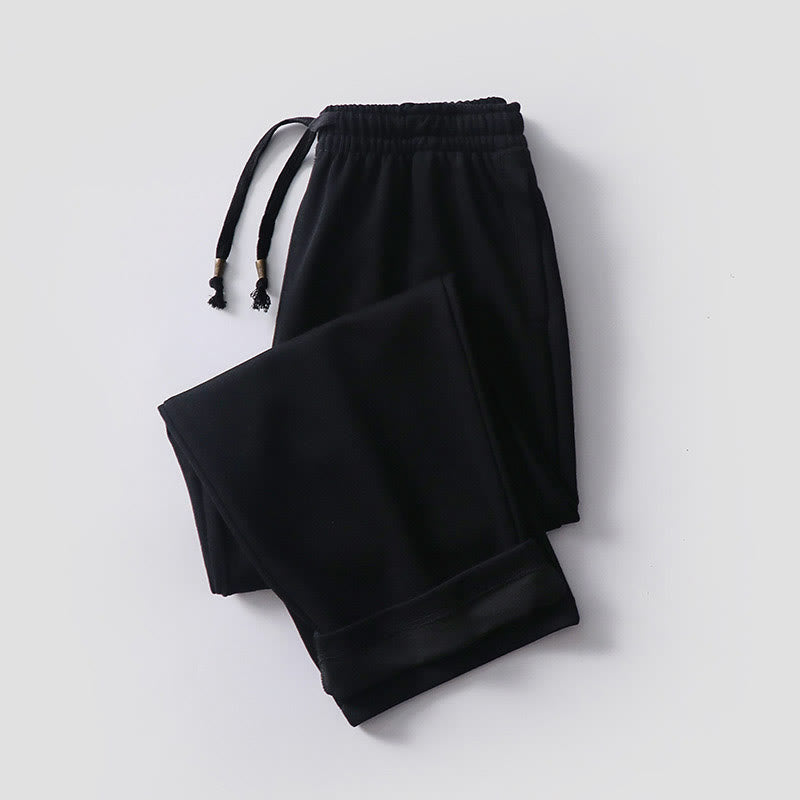 Pantalones de hombre con bolsillos y tejido polar de algodón de color liso con Buddha Stones