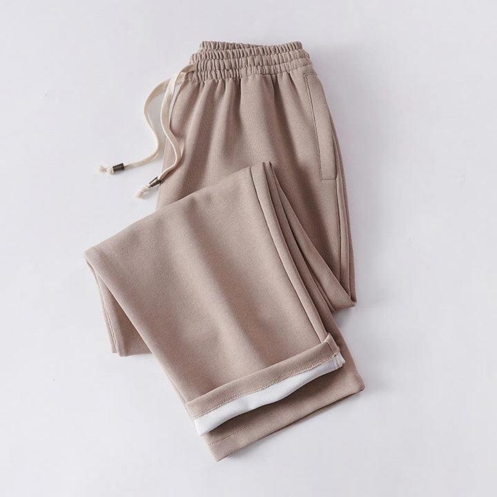 Pantalones de hombre con bolsillos y tejido polar de algodón de color liso con Buddha Stones