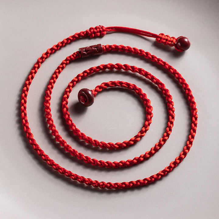 Cadena para el vientre con hilo rojo y bendición de la calma con Buddha Stones y cinabrio natural