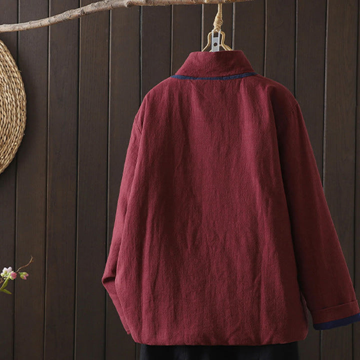 Chaqueta de mujer de algodón y lino con cuello alto, botones de rana y estampado de Buddha Stones en color liso. - image 1