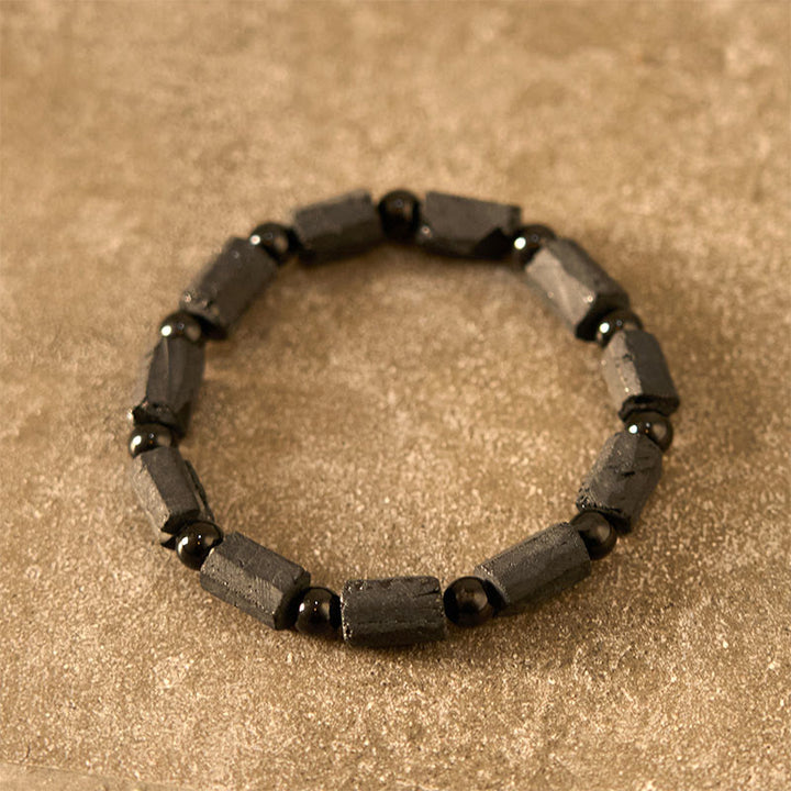 Pulsera de la sabiduría con turmalina negra y Buddha Stones