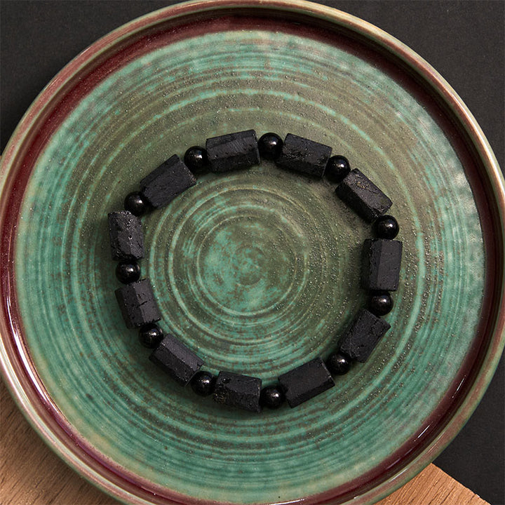 Pulsera de la sabiduría con turmalina negra y Buddha Stones