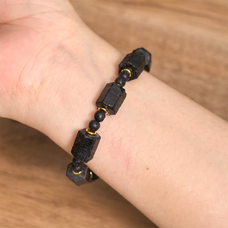 Pulsera de turmalina negra con Buddha Stones