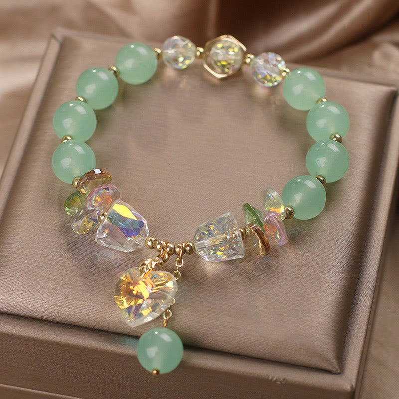 Pulsera curativa con dijes de corazón de amor y cristal verde aguamarina de Buddha Stones