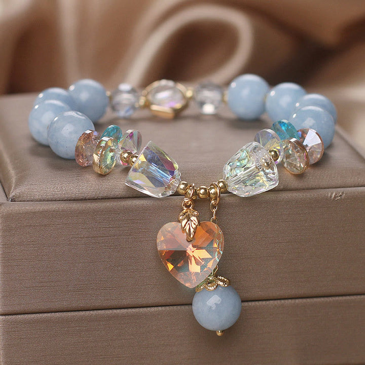 Pulsera curativa con dijes de corazón de amor y cristal verde aguamarina de Buddha Stones