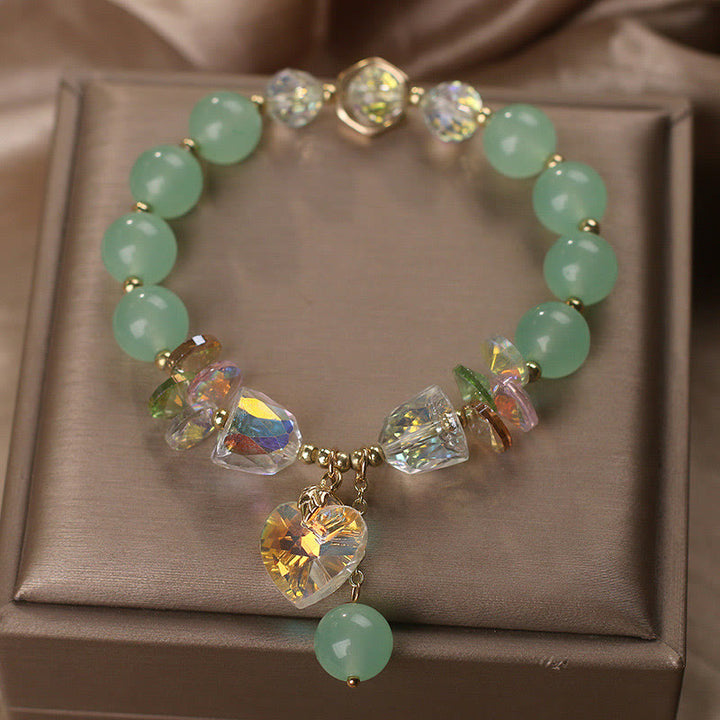 Pulsera curativa con dijes de corazón de amor y cristal verde aguamarina de Buddha Stones