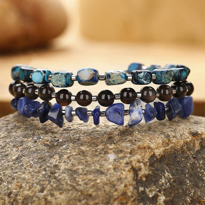 Pulsera de triple vuelta con Buddha Stones, piedra emperador, sodalita, oro y obsidiana brillante