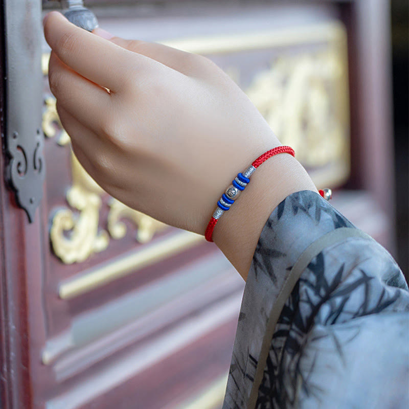 Pulsera protectora con caracteres chinos y hilo rojo de Buddha Stones