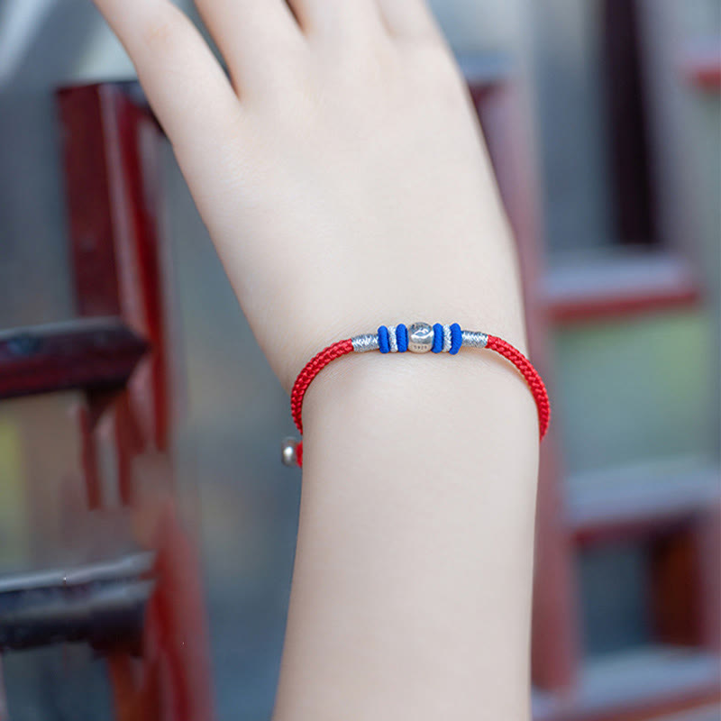 Pulsera protectora con caracteres chinos y hilo rojo de Buddha Stones