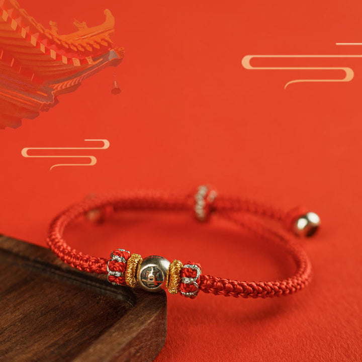 Pulsera protectora con caracteres chinos y hilo rojo de Buddha Stones
