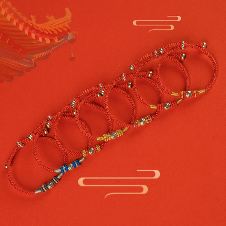 Pulsera protectora con caracteres chinos y hilo rojo de Buddha Stones