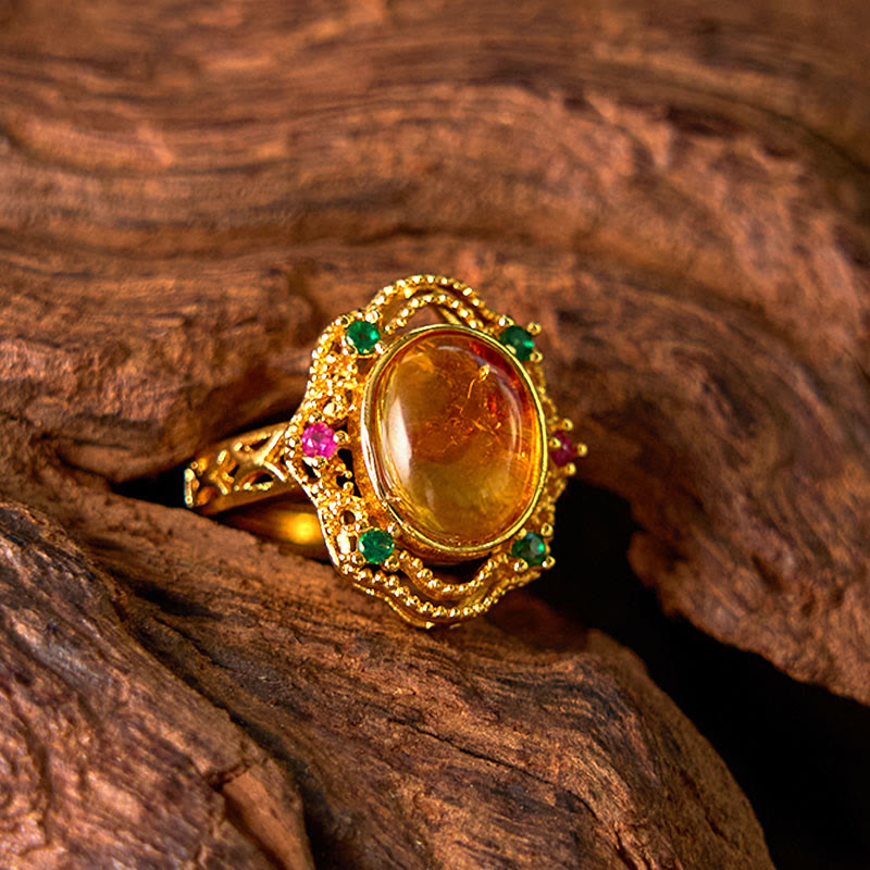 Anillo ajustable con encaje hueco de ámbar y flores de Buddha Stones