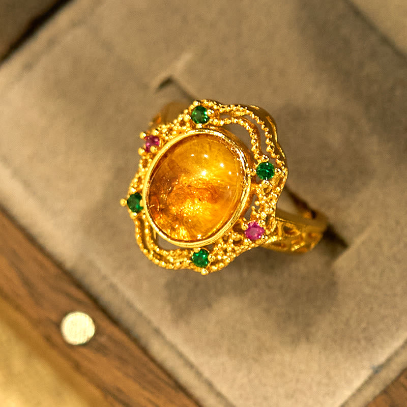Anillo ajustable con encaje hueco de ámbar y flores de Buddha Stones