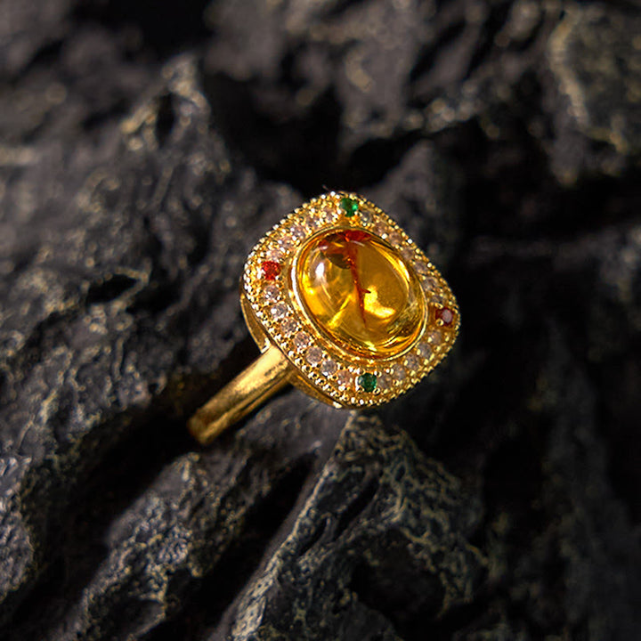 Anillo de confianza con diamantes y soporte cuadrado de flor de ámbar natural de Buddha Stones