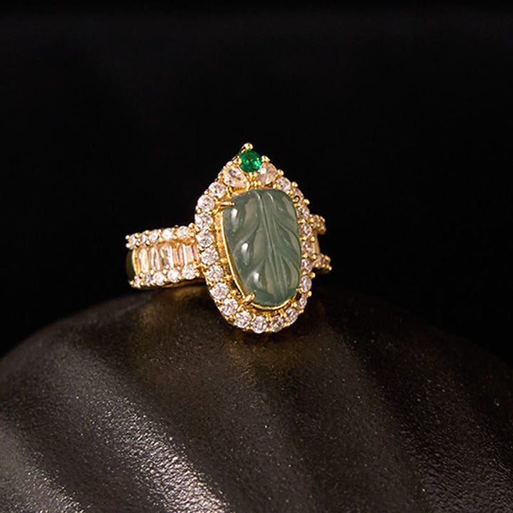 Anillo ajustable con diamantes de la suerte y hojas de jade natural bañadas en oro y cobre con Buddha Stones