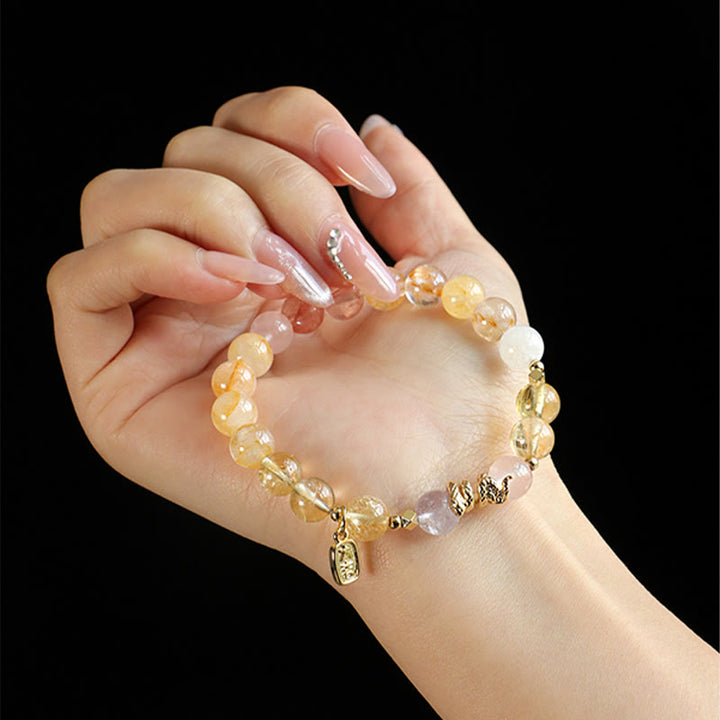 Pulsera de la suerte del año de la serpiente con Buddha Stones, varios cristales, cristal rosa y amatista