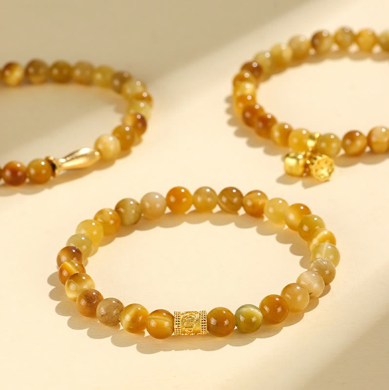 Pulsera de protección con Buddha Stones, ojo de tigre, carácter Fu, bambú, pez Koi, loto, Om Mani Padme Hum
