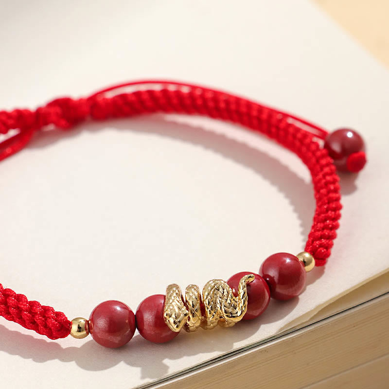 Pulsera trenzada de protección hecha a mano con Buddha Stones y cinabrio con hilo de serpiente
