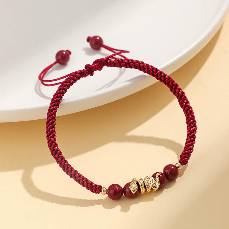Pulsera trenzada de protección hecha a mano con Buddha Stones y cinabrio con hilo de serpiente