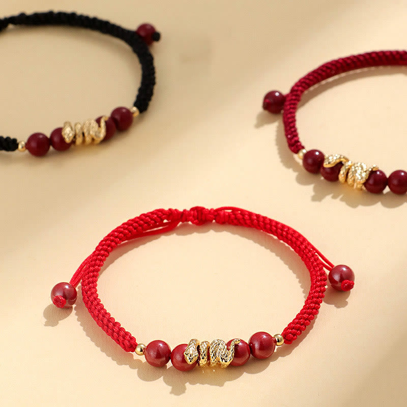 Pulsera trenzada de protección hecha a mano con Buddha Stones y cinabrio con hilo de serpiente