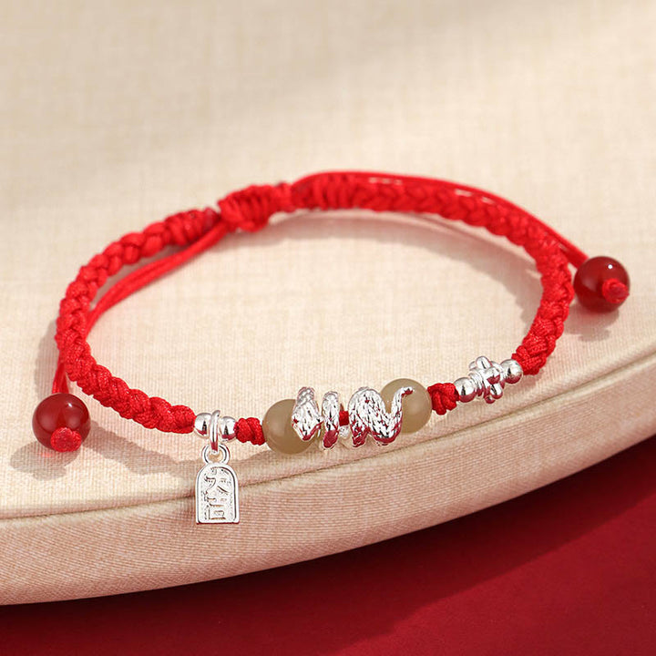 Pulsera trenzada protectora con hilo de jade hetiano y Buddha Stones para el año de la serpiente