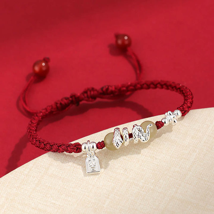 Pulsera trenzada protectora con hilo de jade hetiano y Buddha Stones para el año de la serpiente