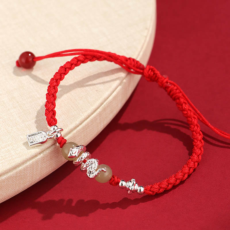 Pulsera trenzada protectora con hilo de jade hetiano y Buddha Stones para el año de la serpiente
