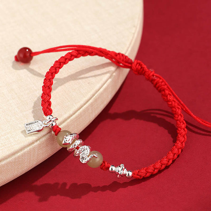Pulsera trenzada protectora con hilo de jade hetiano y Buddha Stones para el año de la serpiente